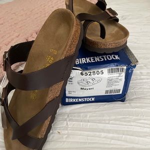 Brand new Birkenstock. Brown leather strap Size 9